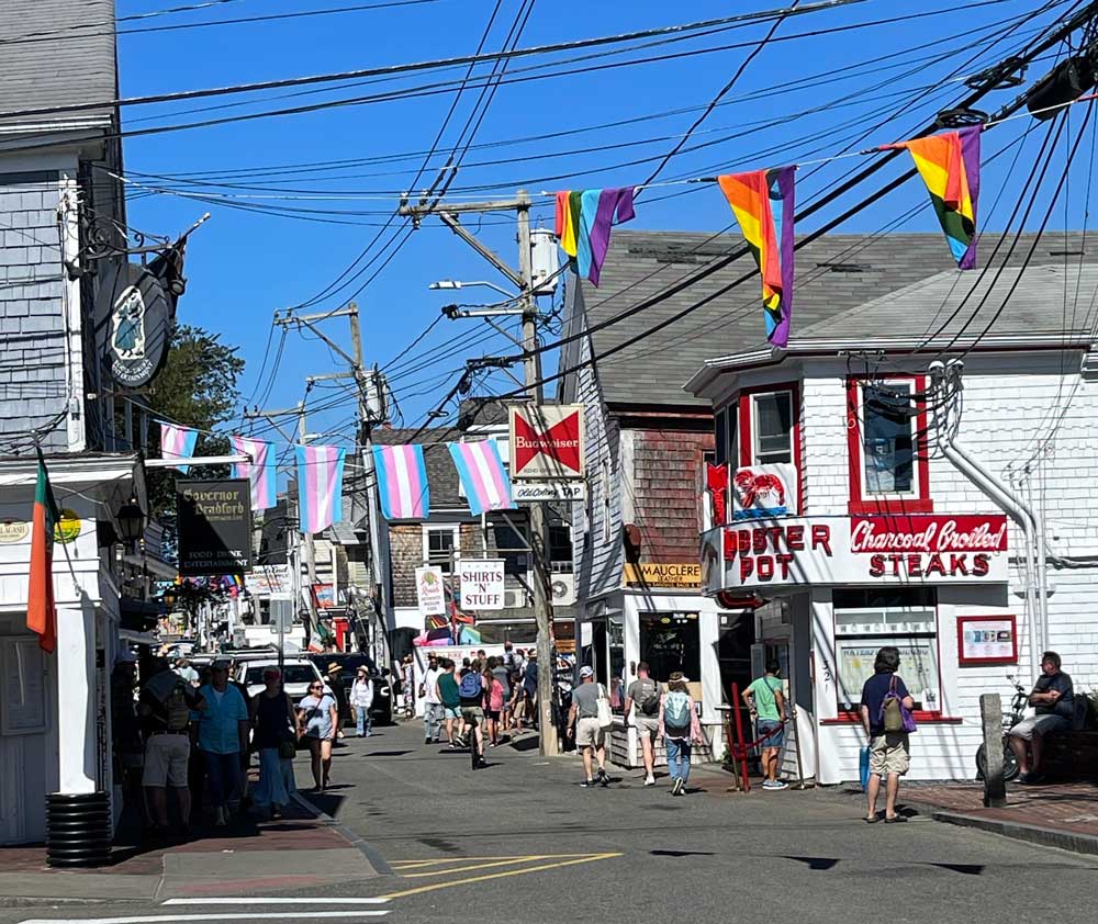 Photo of the main street in Provincetown with iconic lobster restaurant in the corner